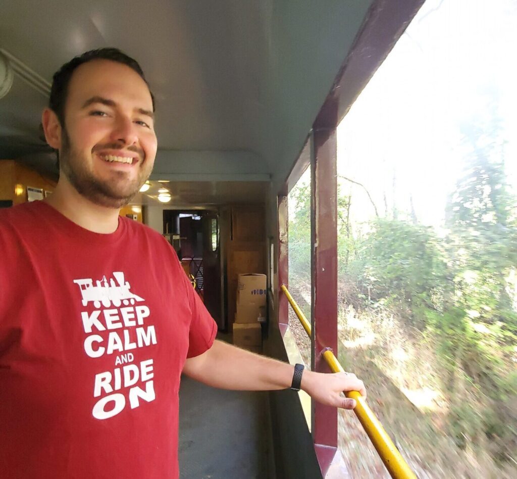 Chris Ehlers in a train, Brewer Extraordinaire and Manager of Off the Rails Kombucha